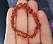Amber Teething Bracelet for Baby Cognac Color. 100% Natural Baltic Amber, Baroque Style Round Raw Beads 5.5 in Long.