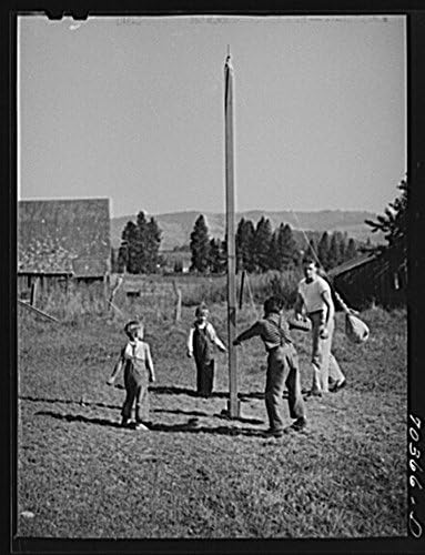 1941 Photo Playtime at the FSA Farm Security Administration mobile camp for...