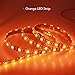 ALITOVE Orange LED Strip Lights 16.4ft 5050 SMD Black PCB 5M 300 LEDs Waterproof IP65 12V DC for Home Hotels Clubs Shopping malls Cars Lighting