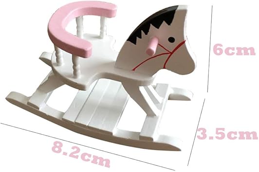 white wooden rocking chair nursery