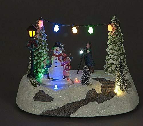 Musical Christmas Scene LED Lit Up Rotating Snowman Carousel 14cm High