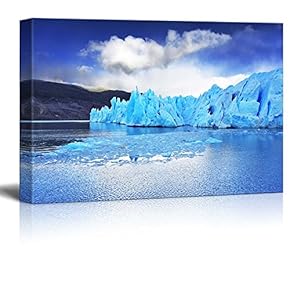 Beautiful Scenery of a Sharp Wind and The Cold Sun Over Blue Ice Iceberg - Canvas Art Wall Art - 12" x 18"