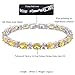 RIZILIA Oval Cut Simulated Yellow Citrine and White Cubic Zirconia 18K White Gold Plated Tennis Bracelet, 7