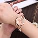 Han Shi Watches, Women Fashion Casual Business Eiffel Tower Quartz Wristwatch Round Clock (L, Rose Gold)