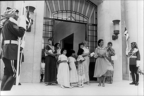 Vintage photo of Princess Nuna (King Hussein39;s ex-wife), in sunglasses, and the king39;s sister-in-law leave Saharan Villa for the wedding reception in the garden.