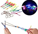 12 pieces Large Size Amazing Led Light Slingshot Arrow Rocket Helicopter Flying Toy Party Fun Gift Elastic