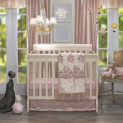 pink mini crib
