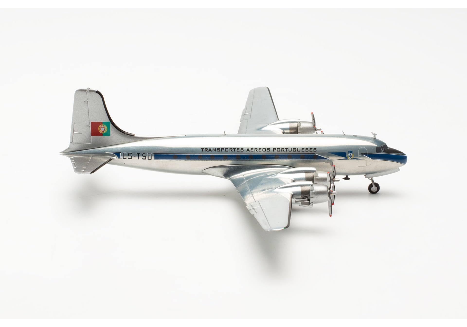 herpa airplane model TAP Air Portugal Douglas DC-4 – CS-TSD, on a scale of 1:200, metal miniature with pedastal, model building, collectors edition