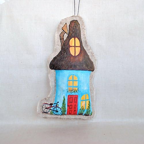 Pendant fairy house with a red door. Stuffed decorations