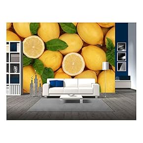 Group of Fresh Lemons with Leaves and Sliced Lemons Forming a Background - Removable Wall Mural | Self-Adhesive Large Wallpaper - 66x96 inches
