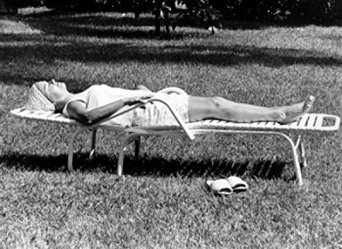 Amazon Com Posterazzi Woman Sunbathing In Backyard Poster Print