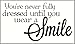 Wall Decor Plus More WDPM3183 Never Dressed Wear a Smile Wall Decal Inspirational Quote 23x12.5 Inch Black