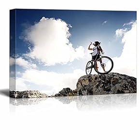 Cyclist Drinks Water on Top of a Mountain with Bike on a Sunny Day ation - Canvas Art Wall Art - 12"x18"