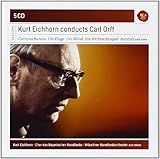 Conducts Carl Orff