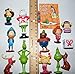 The Grinch Movie Deluxe Party Favors Goody Bag Fillers Set of 14 with 12 Figures Featuring Classic and New Characters and a Special Notebook and Eraser!