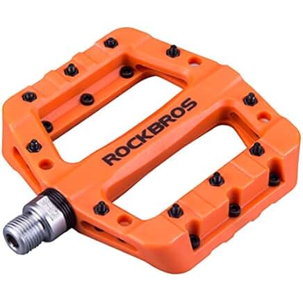 orange metal bike pedals