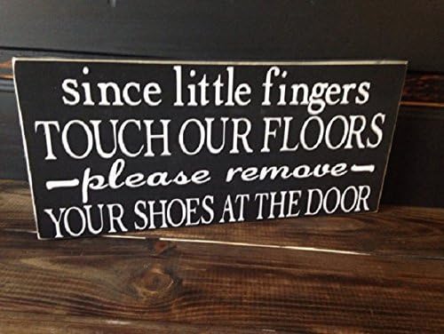 Since little fingers touch our floors please remove your shoes at the door, sign