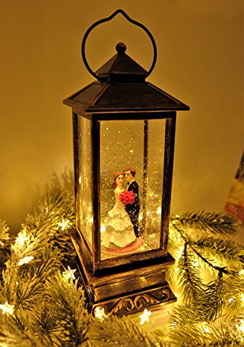 image for Eldnacele Battery Operated Lighted Wedding Snow Globle Water Snow Glit