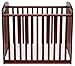 Davinci Alpha Mini Rocking Crib in Rich Cherry, Removable Wheels, Greenguard Gold Certified