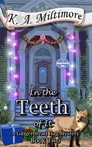 In the Teeth of It: A Gingerbread Hag Mystery - Book Two by K. A. Miltimore