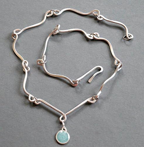 womens light weight si;ver tone sapphire resin and aluminum nacklace