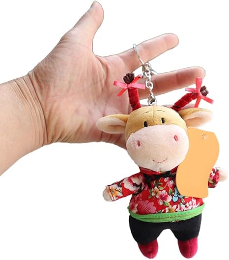 Amazon Co Jp 面白い漫画の牛キーホルダー 21年風水手作り干支縁起の良い牛 ブルラッキーキーリングキーホルダーお守り 幸運と富のために B ホーム キッチン