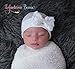Infanteenie Beenie White Ruffled Bow on a White Newborn Hospital Hat