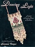 Dancing Light: Beaded Amulet Purse Necklaces by 
