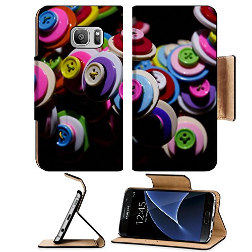 MSD Premium Samsung Galaxy S7 Flip Pu Leather Wallet Case IMAGE 35064457 handmade button isolatiob in black background photo