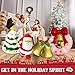 Christmas Squishies Toys (4 Pcs) - Xmas Donut Squishy, Christmas Bell, Christmas Squishy Tree & Santa Squishy. Bonus Xmas Stickers and Keychains.