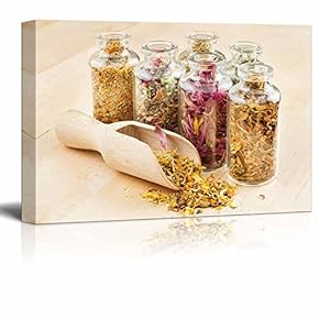 Healing Herbs in Glass Bottles and Wooden Scoop...