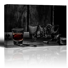 Centered in on Single Shot of Whiskey Surrounded by Shot Glasses and a Revolver - Canvas Art Home Art - 12x18 inches