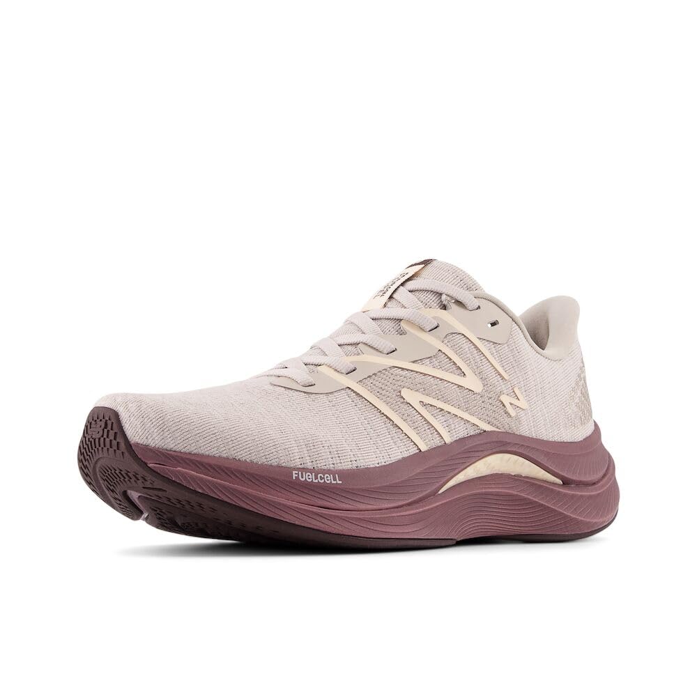 New Balance Women's FuelCell Propel V4 Running Shoe, Moonrock/Licorice/Vintage Rose, 5 Wide Image