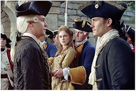 Amazon Com Pirates Of The Carribean Tom Hollander As Cutler Beckett Keira Knightley As Elizabeth Swan And Orlando Bloom As Will Turner 8 X 10 Inch Photo Entertainment Collectibles