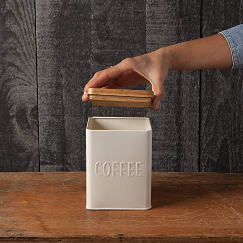Whether indulging oneself or seeking a delightful gift, the Now Designs L170001aa Square Coffee Tin beautifully combines practicality and style. Revel in the assurance that your coffee stays fresh while satiating your aesthetic preferences. Don't settle for average storage - embrace the appeal and sophistication this tin exudes. Description by ChatGPT.