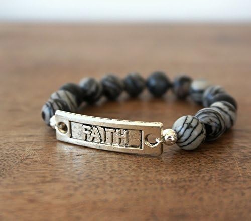 Religious Stretch Bracelet featuring Black and White Silk Stone Gemstone Beads and a silver or brass faith link