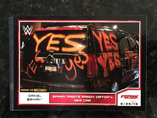 2014 Topps WWE Road To Wrestlemania #35 Daniel Bryan Spray Paints Randy Orton's New Car Trading Card in a Protective Case With a Small Stand