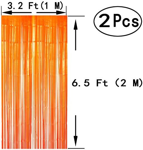 Colorful foil fringe curtain decorations for a birthday party.