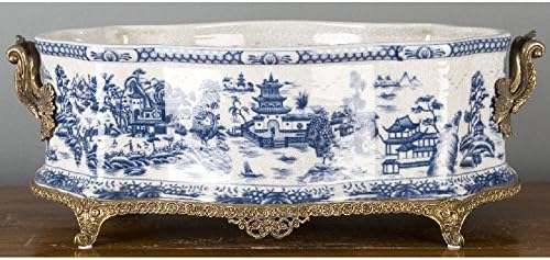 Home decor. Blue and White Porcelain Planter With Bronze Ormolu. Dimensions: 20 x 11.5 x 7. Pattern: Blue Willow.