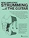 Strumming the Guitar by 