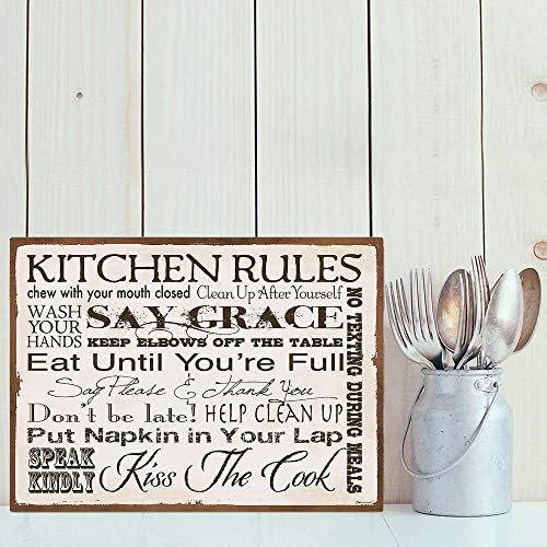 Rustic wooden kitchen sign with decorative text.