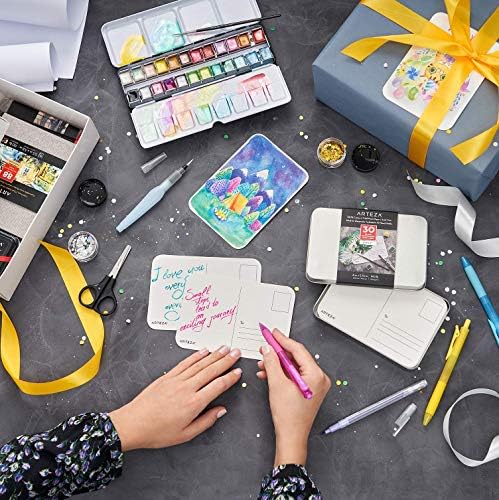 Colorful watercolor playing cards on a white background.