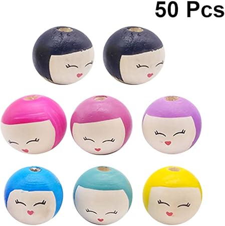 wooden doll heads with faces