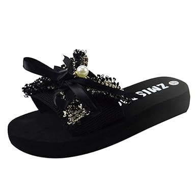 black bow flip flops