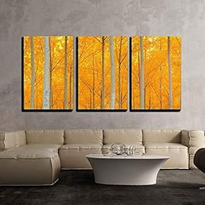 A Stand of Trees Begins to Weather The...