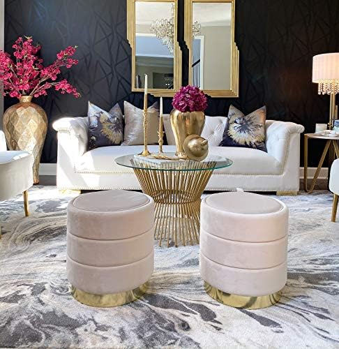 A gray ottoman with a sleek design, providing comfortable seating for a blissful touch in any area.