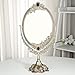 KINGFOM Antique Two Sided Swivel Oval Desktop Vanity Makeup Mirror with Embossed Roses and Mounted Beads for Home, Jewelry or Watches Cosmetics Showcase (Large, Bronze)