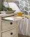 Ashley Furniture Signature Design - Demarlos Nightstand - 3 Drawers with Pull Out Tray - Parchment White