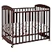 Davinci Alpha Mini Rocking Crib in Rich Cherry, Removable Wheels, Greenguard Gold Certified