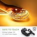 Ustellar Dimmable 600 LED Light Strip Kit with Power Supply, SMD 2835 LEDs, Super Bright 16.4ft/5m 12V LED Ribbon, Non-Waterproof, 3000K Warm White Lighting Strips, LED Tape